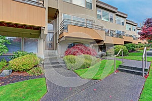 Entrance of an apartment building with concrete steps