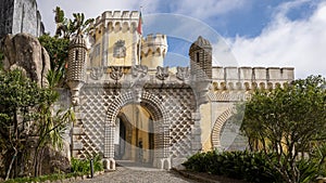 Entrance arch of The Pena Palace, a Romanticist Castle in Sao Pedro de Penaferim, in Sintra, on the Portuguese Riviera.