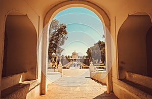 Entrance in arch to historical building of Tipu Sultan Gumbaz in Srirangapatna, India. 18th century Muslim mausoleum