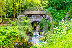 Entrance Bridge to Sigmund Thun Gorge. Cascade valley of wild Kapruner Ache near Kaprun, Austria