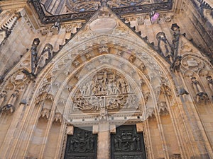 The entrance of the cathedral of saint vitus, prague, czech republic with the detailed carvings