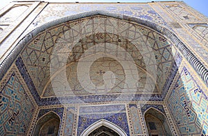 Entrance decorations of the UlugBek Madrasah in Samarkand, Uzbekistan