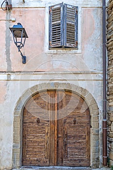 Entrance door of an ancient building in Piran town.