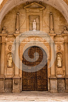 Entrance door of the main church in the small town of El Toboso (Spain