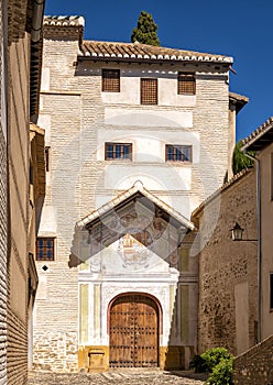 An entrance door of the Monastery of Santa Isabel la Real de Granada founded by Catholic Monarchs May 15, 1501.