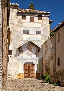 An entrance door of the Monastery of Santa Isabel la Real de Granada founded by Catholic Monarchs May 15, 1501.