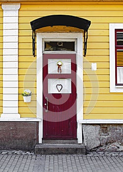 Entrance door. The porch of the house.