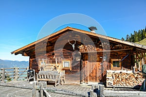 Entrance door to old wooden cabin at mountain meadow in the austrian alps, Zillertal Austria Europe