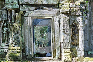 Entrance door of a typical temple ruin of Ankor Wat in Cambodia during daytime