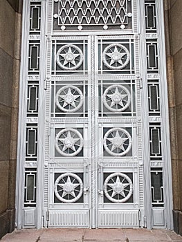 Entrance doors of Ministry of Foreign Affairs with stars and soviet symbols on them