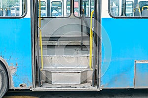 Entrance doors with stairs of old city public transport bus