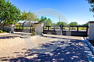 Entrance And Exit Gates To Secure Subdivision