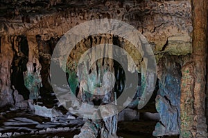 Entrance, Fontein cave, Aruba. Stalactites, multi-colored stone formations.