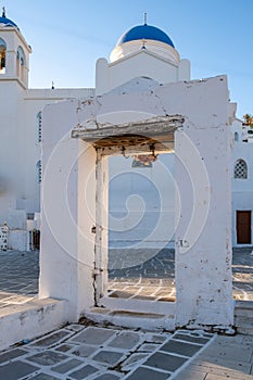 Entrance gate of Evangelismos Cathedral church at Ios, Nios island, Cyclades, Greece. Vertical photo