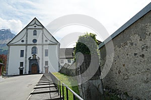 An entrance gate, facade or door of Engelberg Abbey, Benedictine monastery and the St. Jacob chapel