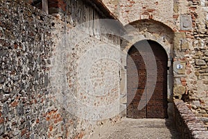 Entrance gate of medieval castle Castello Mediceo