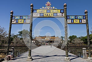 Entrance gate to citadel with roayal palacr in background, Hue,