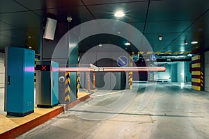 Entrance gate to underground garage parking lot, auto park interior inside