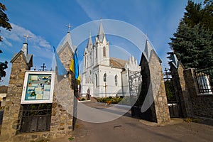 Entrance gates to the churchyard of St. Anna Roman Catholic Church, old Christian temple in Neo Gothic style, beautiful religious