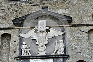 Decoration above the entrance to the Castle of Sant'Elmo. Vomer . Naples photo