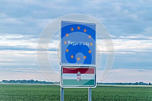 Entrance Hungary Magyarorszag border sign and flag of Hungary on the Austria - Hungary border