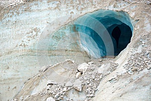 Entrance of an ice cave in the glacier Mer de Glace, in Chamonix Mont Blanc Massif, The Alps France