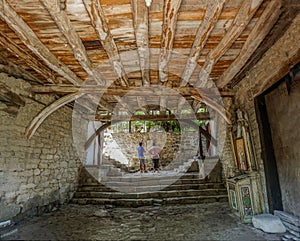 The entrance of Kapinovski Monastery St. Nicholas built of centuries-old trees in 1835 .