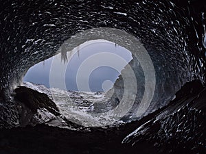 Entrance of the large Sapphire Ice Cave, located in BreiÃ°amerkurjÃ¶kull glacier, VatnajÃ¶kull, southern Iceland.
