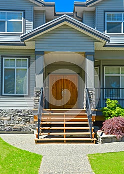 Entrance of luxury family house on a sunny day in Vancouver