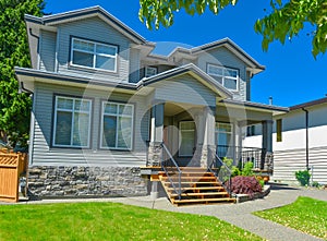 Entrance of luxury family house on a sunny day in Vancouver