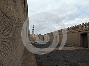 Entrance of Mosque of Ibn Tulun in Cairo, Egypt - Ancient architecture - Sacred Islamic site - Africa religious trip