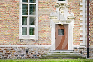 Entrance of an old big house in Bruges