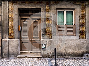 Entrance of an old building in Bairro Alto, Lisbon, Portuga photo