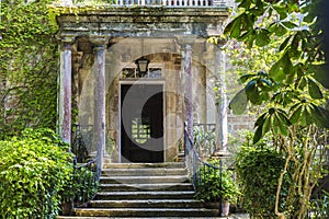 Entrance of an old mansion with garden