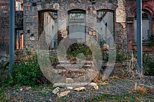 Entrance in old ruined abandoned house