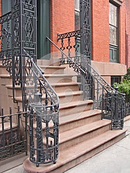 Entrance with ornate railings