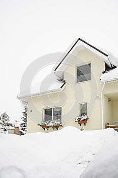 Entrance of a private house under snow in winter