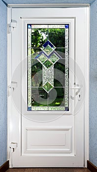 Entrance pvc door with tiffany leaded pane