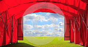 Entrance red gate of the football or soccer or baseball stadium with blue sky clouds background. Concept of opportunity to success