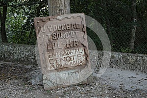 Entrance sign to Cenote Flor de Agua