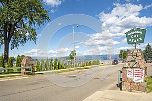 The entrance and sign to the Sandpoint City Beach and park at Sand Creek River and Lake Pend Oreille in Sandpoint, Idaho