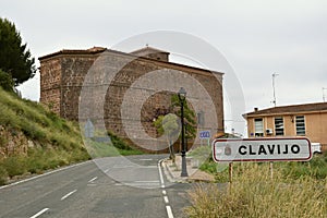 Entrance sign to the village of Clavijo by road.