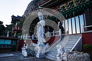 Entrance and Statua at Sanbanggulsa temple after sunset, Sanbang-ro, Jeju Island, South Korea