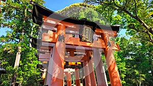 Entrance of a thousand torii in Kyoto inari shrine in Japan