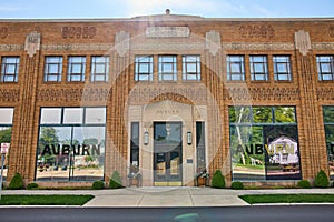 Entrance to ACD Automobile Museum on bright summer day with reflective windows