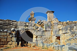 Entrance to Amphitheater Harpy tomb monument sarcophagus at Xanthos ruins. Turkey. UNESCO world heritage