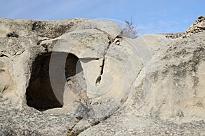 Entrance to ancient cave dwelling in Uplistsikhe town,Georgia