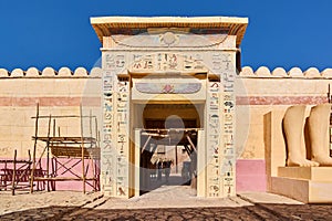 Entrance to ancient Egyptian temple with winged scarab