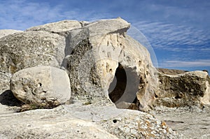 Entrance to ancient house in cave town Uplistsikhe, Georgia