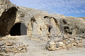 Entrance to ancient house in cave town Uplistsikhe, Georgia